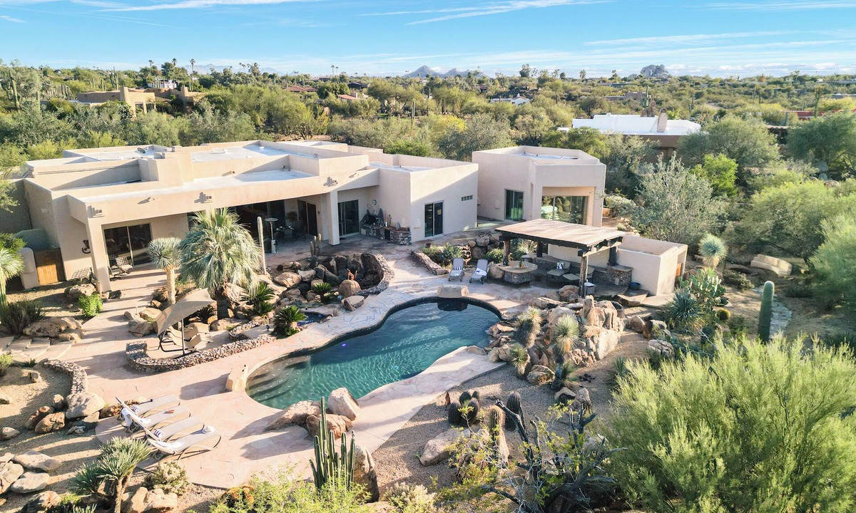 Carefree House | 5BDR Oasis w/Waterfall Pool, Hot Tub, Desert View | Desert Cascase by AvantStay