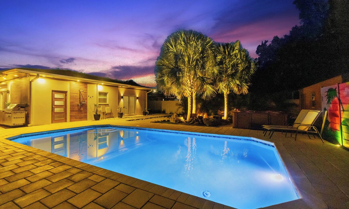 Riverside Heights House | Luxe 4BR/5BA MCM Retreat w/Heated Pool, Hot Tub & Sauna in Prime Tampa Location