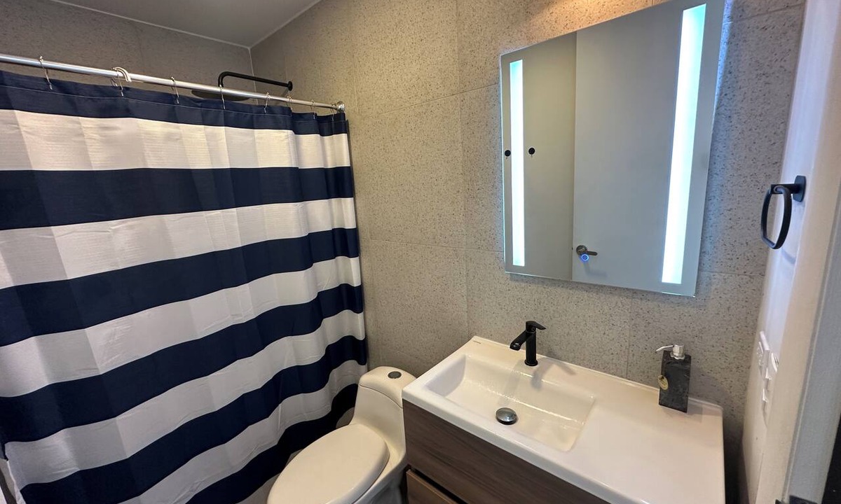 Centro Apartment | Sleek Modern Condo in Downtown Tijuana - Free Parking, 24/7 Security, and Rooftop