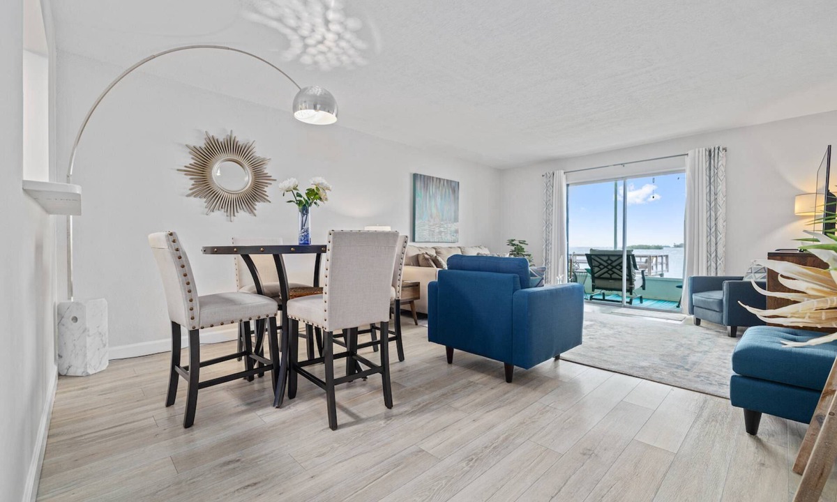 Dunedin Condo | Waterfront Condo w/Heated Pool, Pier & Sunset Views – Walk to Dunedin Causeway & Honeymoon Island!