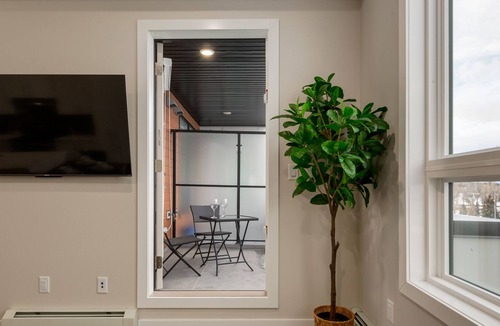 Shaganappi Apartment | $0 Cleaning Fee, Free Parking, King Bed, Top Floor