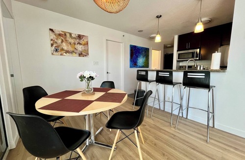 Crosstown Apartment | 1 bedroom + Sofabed, Private 500sqft sun deck, EV Parking w/Pool, Sauna, Hot Tub