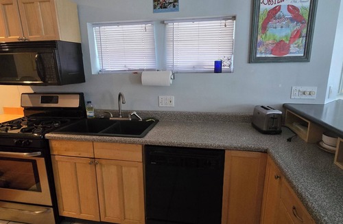 Owls Head Apartment | 1-BR waterfront apt with wood-burning sauna & pool table