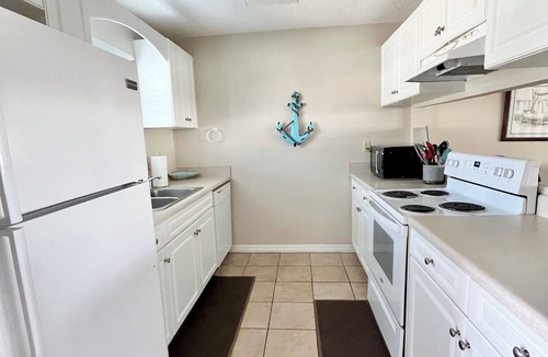 Sugar Beach House | 2 BR Gulf Front Complex - Heated Pool - Ask about SNOWBIRD DISCOUNTS!