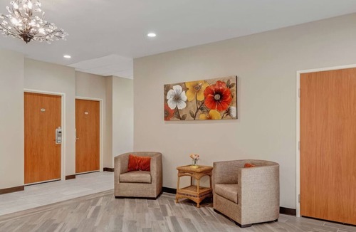 Eastside Promise Neighborhood Hotel | 2 Family-Friendly Rooms Near DT Entertainment Venues w/Free Breakfast