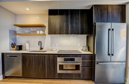 Rainey Street Historic District Condo | 2BR Condo near Rainey St | Heated Pool | Gym | Bar
