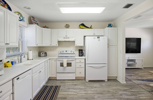 Clearwater Beach House | 4-Bed Coastal Retreat: Heated Pool, 200 Steps to Beach, Walk to Fun!