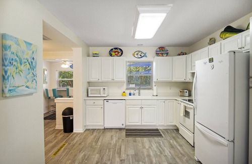 Clearwater Beach House | 4-Bed Coastal Retreat: Heated Pool, 200 Steps to Beach, Walk to Fun!