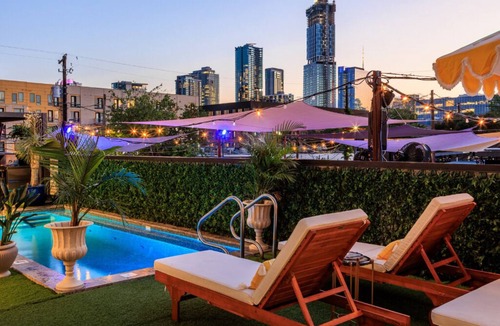 East Cesar Chavez House | 6th Street Suite: 4BR/11Beds - Pool, Roofdeck, Garden Bars, Walk To Everything!