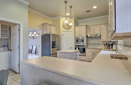 Travis Landing Villa | Airy Villa in Austin w/Badminton/Volleyball Court