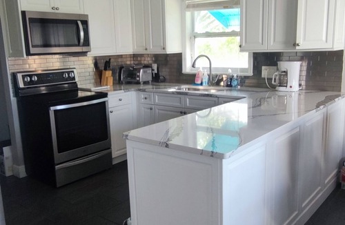Riverview House | Alafia River waterfront house with pool & dock