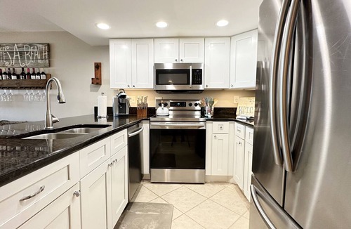 Indian Shores Condo | Beachfront Paradise, Retro Twist, Exquisite Views, Private Entrance, EV Car Charger!