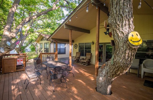 New Braunfels House | Bohemian Hill: NB Cypress-Lined Guadalupe Riverfront + Main & Guest House + Shady Decks & Backyard