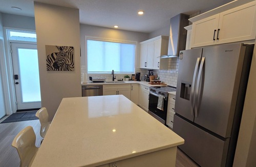 Southwest Calgary House | Brand new 4-Brm + Den main floor unit in quiet community. Sleeps up to 10.