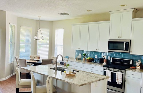 Apollo Beach House | Bright 4BR home near pool and beaches, perfect for families and groups.
