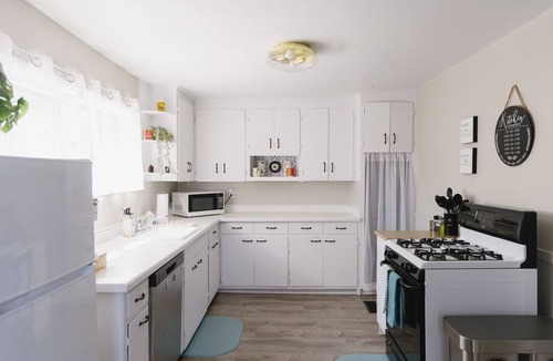 Marshland House | Charming 1BR house with WiFi, AC, Private Patio + Cruiser Bikes & Grill Add-Ons