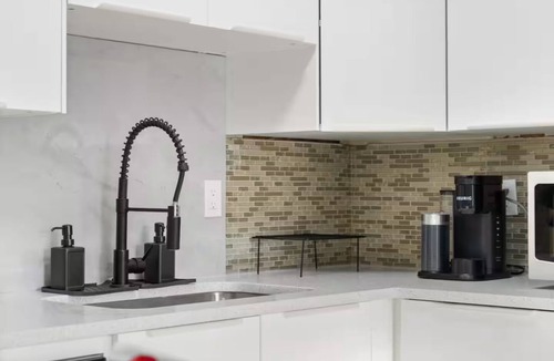 Montgomery House | Charming 4-bedroom house with AC in vibrant Calgary