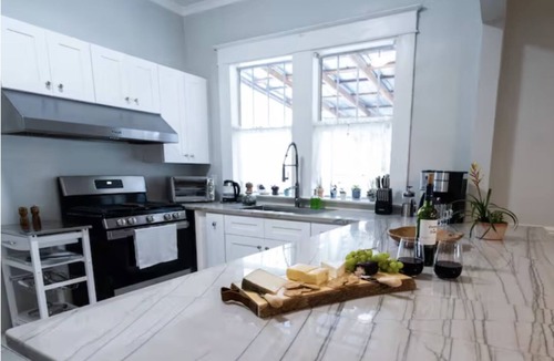 Ybor City House | Charming Bungalow with Guesthouse Hot tub, Fire Pit,Outdoor Kitchen-Pet friendly
