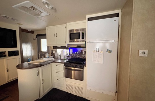 Greenbush RV Rental | Charming camper within Trails End ChinoteagueBay Resort in Horntown VA