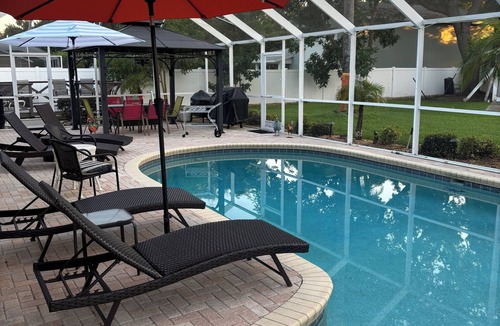 Lake Valencia Apartment | Charming studio in beautiful Palm Harbor with A/C, Swimming Pool and Patio