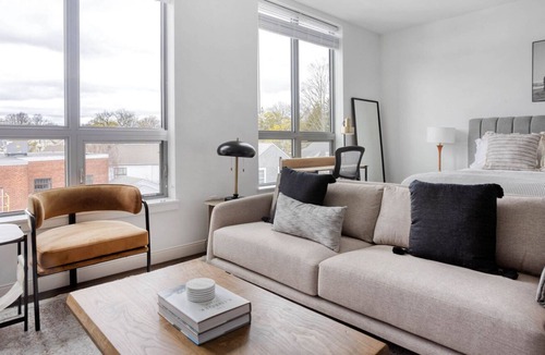 Newtonville Apartment | Chic studio w/ Gym, W/D, Steps from Newtonville Train by Blueground