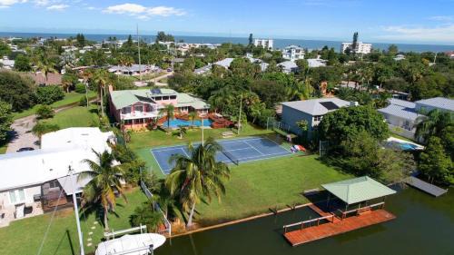 Snug Harbor Estates House | Cocoa Beach Riverfront Pool Home