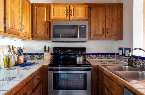 Arroyo Seco Apartment | Cozy adobe studio with private balcony, mountain views, and classic Southwest charm—just minutes from Taos, Arroyo Seco, and Taos Ski Valley. Perfect for a peaceful canyon escape with modern comforts.