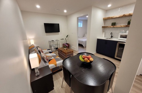Southeast Calgary House | Cozy basement unit near restaurants, bars, stores, bus stations, and hospital.