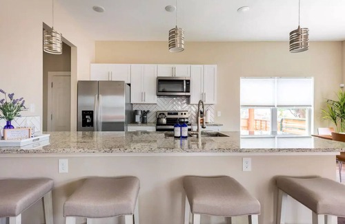 Near East Side House | Cozy Home near Alamodome~Free Gated Parking~Kids Climbing Dome & Backyard games