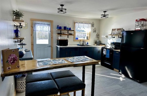 Smithfield Apartment | Cozy new 1 bedroom, queen bed, and queen sofa bed, washer/dryers. Radiant heat.