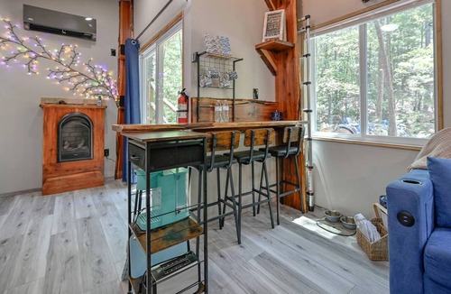 Boles Cabin | Cozy Tiny Cabin with Porch & Fire Pit near Scenic Trails in Western Arkansas