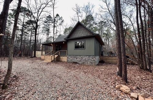 Muse Cabin | Creekside forest hideaway with hot tub near ATV trails