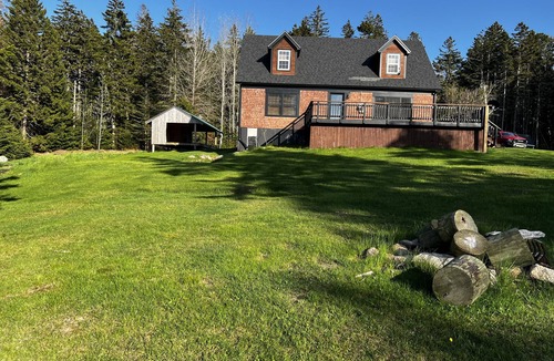 Stonington House | Crystal Cove is a lovely new offering this 2023 season! The home is quietly located in Stonington and has direct ocean access. Follow the Oceanville Road until you reach this lovely property. The house has 4 bedrooms (3 queen rooms and a bunk room)