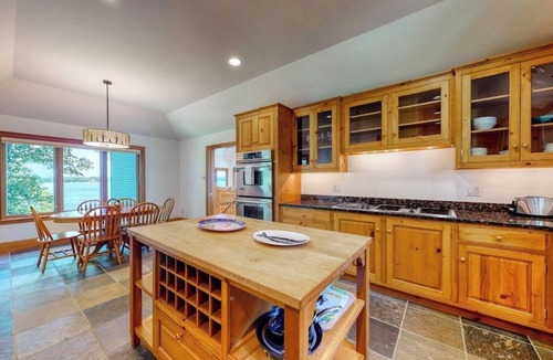 Isle of Springs House | Delightful oceanfront home with amazing views, wrap-around deck & two fireplaces