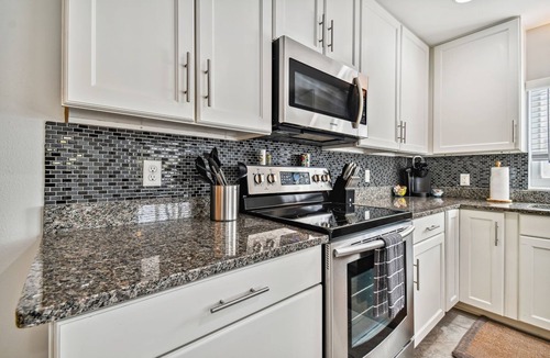Dunedin House | Dunedin Bungalow on Pinellas Trail w/Heated Pool! Walk or Bike to Downtown Dunedin!