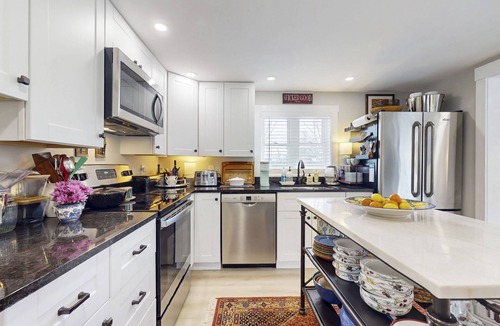 Wiscasset House | Elegant home with a cozy living area, Wifi, backyard, and washer/dryer