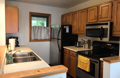 Southwest Harbor Condo | Enjoy the stunning ocean view from the hot tub at Port!