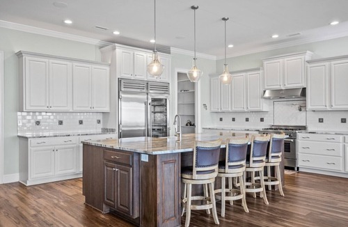 North Topsail Beach House | Experience oceanfront luxury at Topsail Manor, a spacious 8-bedroom paradise in North Topsail Beach.