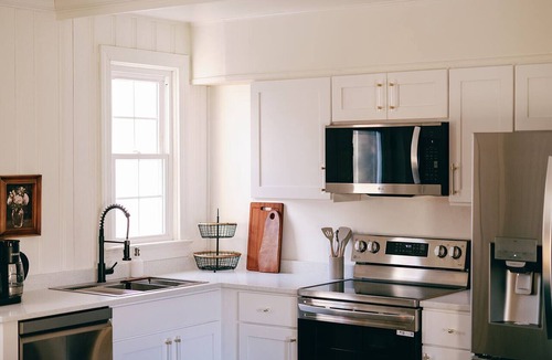 Tappahannock Apartment | Fern and Forest-Restored 1960s Motel, Luxe 2 Bedroom Suite, Woodland Retreat