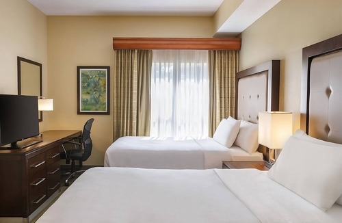 Feather Sound Hotel | Fun and Relaxation! 2 Relaxing Units, Full Kitchen, Free Breakfast, Pool!
