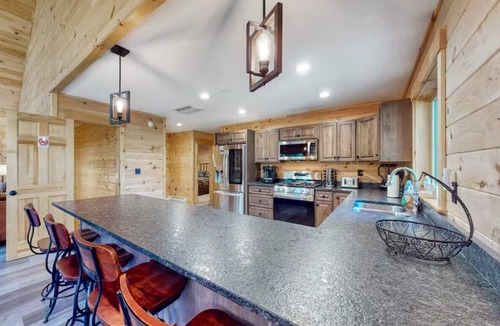 Carrabassett Valley Cabin | Gorgeous dog-friendly cabin with great view, deck, hot tub, & gas fireplace