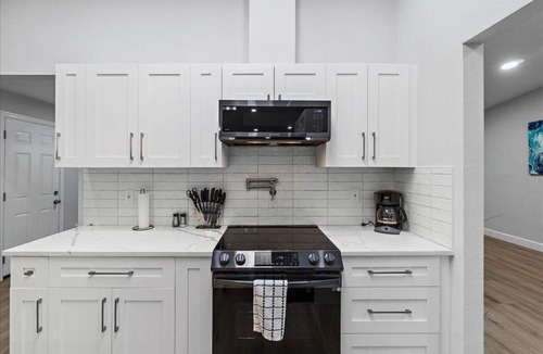Palm Harbor House | Heated Saltwater Pool & Spa l Family Friendly l Near Beaches & Clearwater