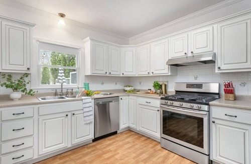 Bristol Condo | Historic 1878 Coastal Condo Downtown Bristol– Family Friendly, Private Hot Tub.