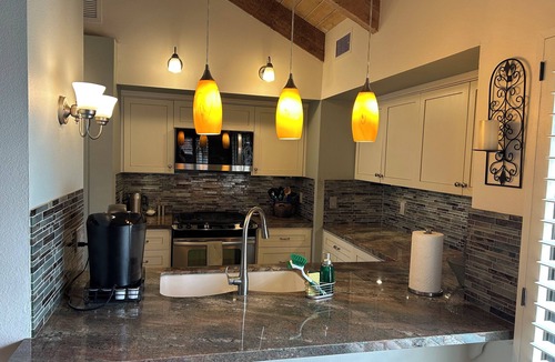 Rancho Mirage Condo | Lakefront Beauty - listen to the birds chirp while drinking your morning coffee