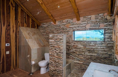 Hudson Bend House | Large Rustic Log Cabin near Lake Travis with 2 Master Suites and Scenic Views
