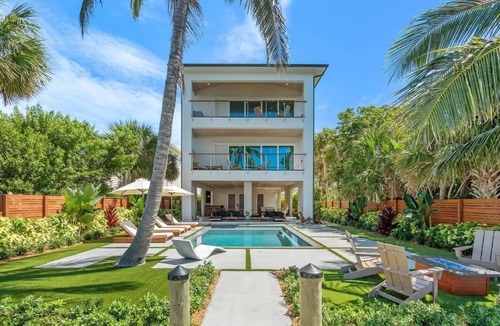 Orlando Beach House | Luxury River front Home/Resort steps to the Beach