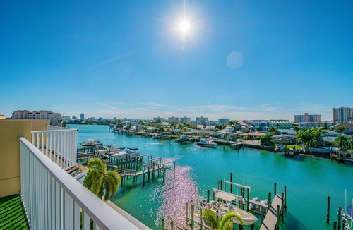 Clearwater Beach House | Luxury waterfront townhome, 5 min to beach, pool, fully stocked, & rooftop deck!