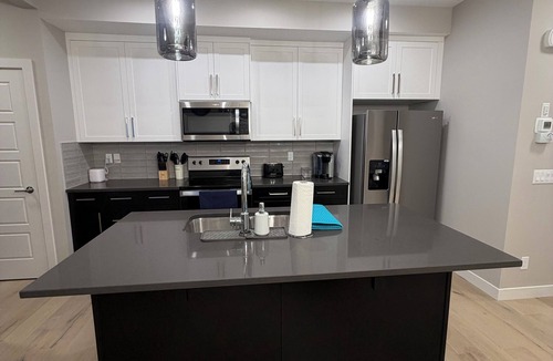 Cochrane House | Modern 3–4 bedroom duplex in the New South Bow Landing community of Cochrane AB
