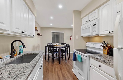 Uptown Condo | NEW 2-bed/2-bath condo in serene Uptown walk to 3 Malls/restaurants/movies