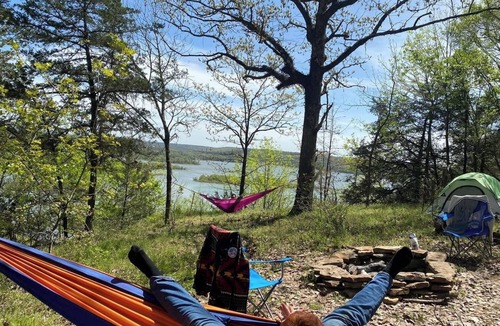Waveland Cabin | Paradiso sunrise waterfront cabin sleeps 10 with large open room and AC, WiFi